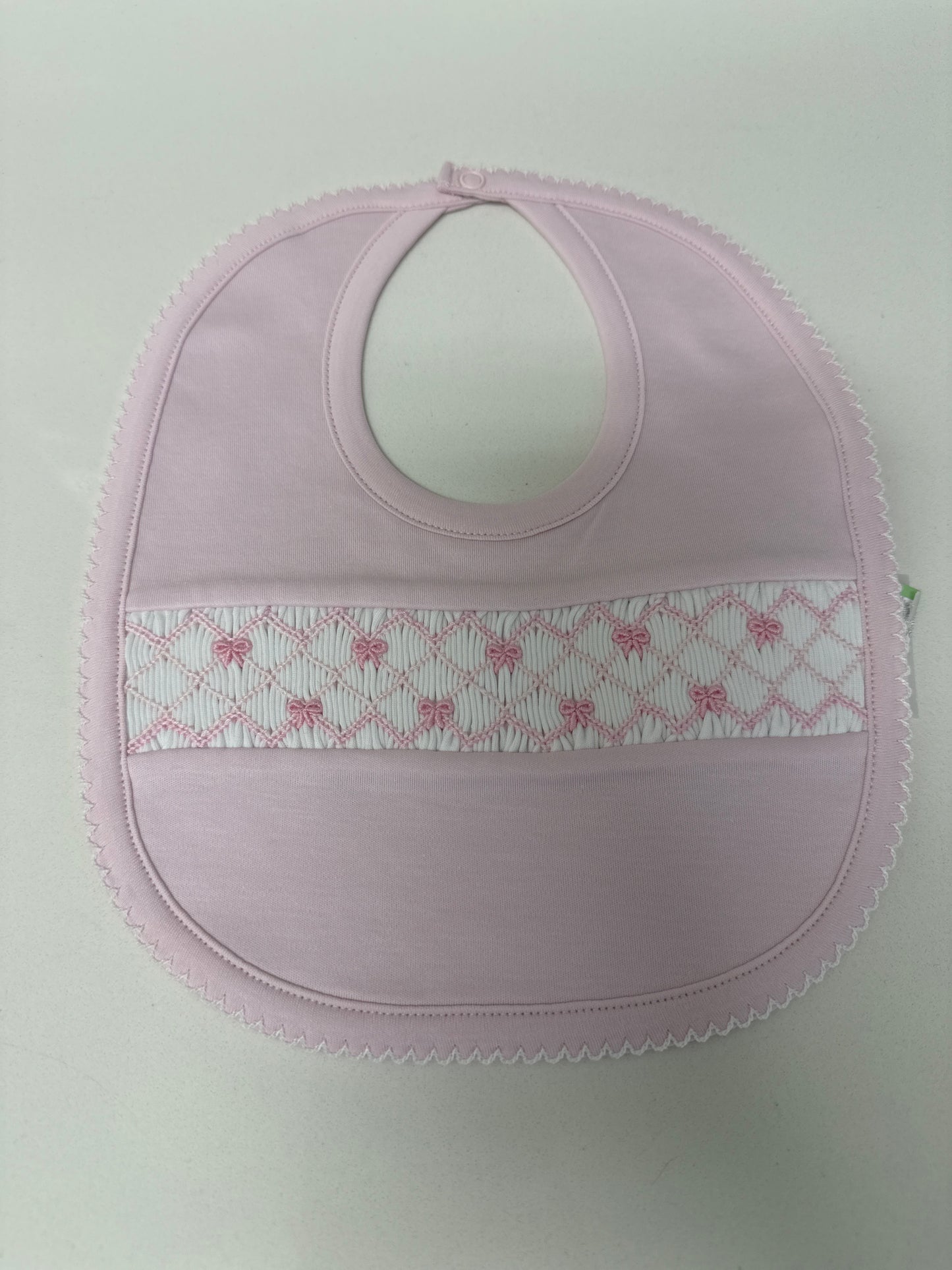 SUMMER BOWS SMOCKED BIB - PINK