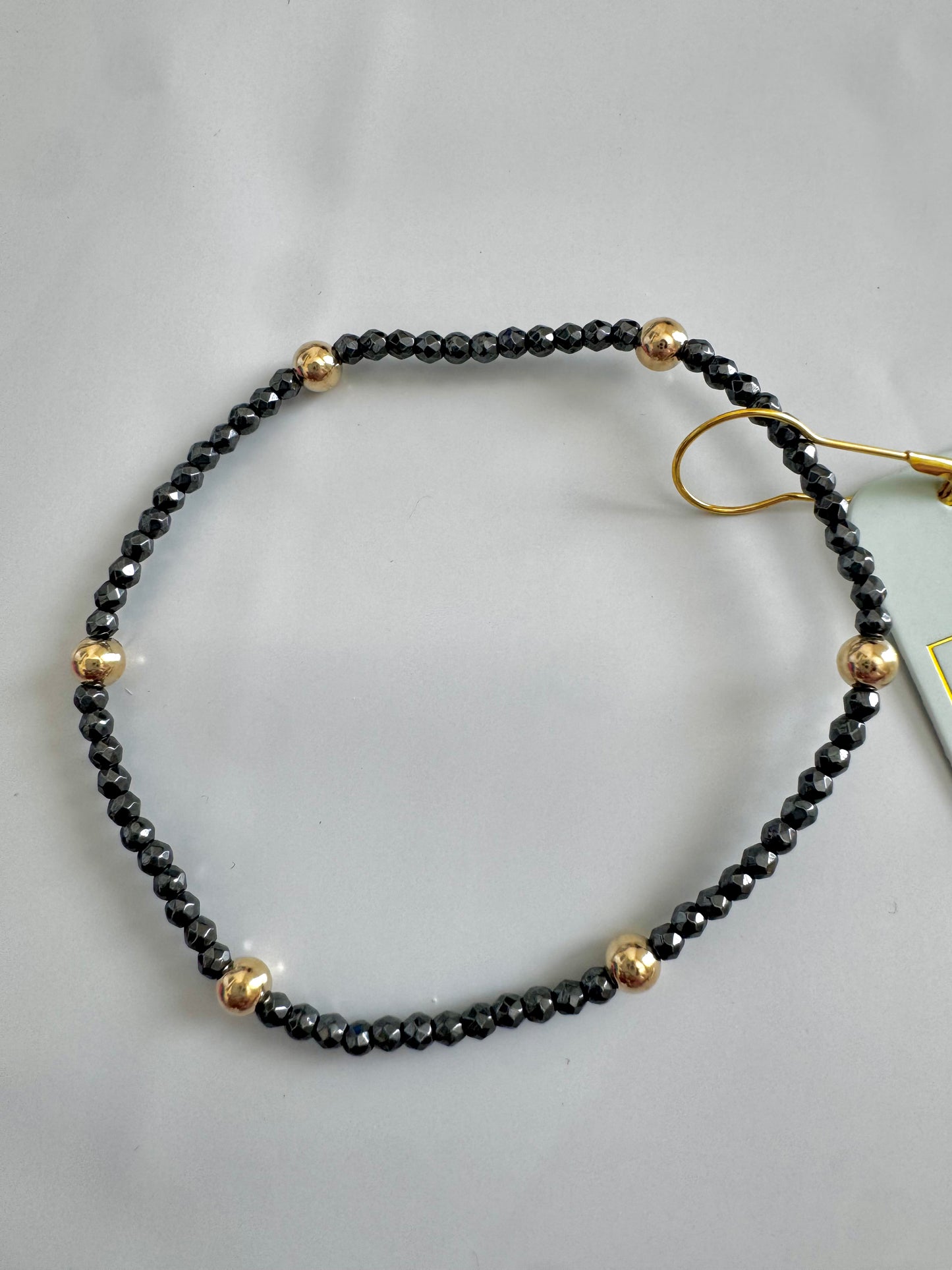 PRESENCE FACETED HEMATITE 2MM BRACELET