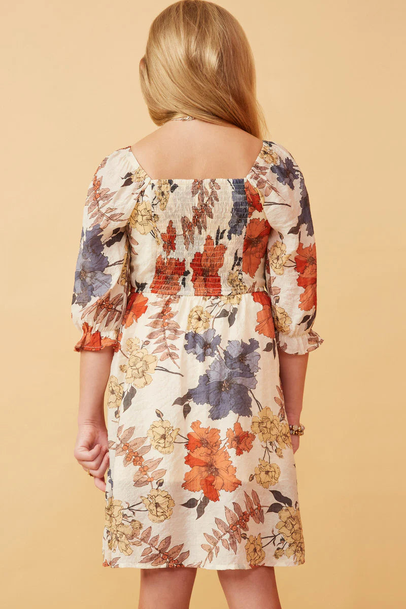 TEXTURED FLORAL SMOCKED SQUARE NECK DRESS - RUST