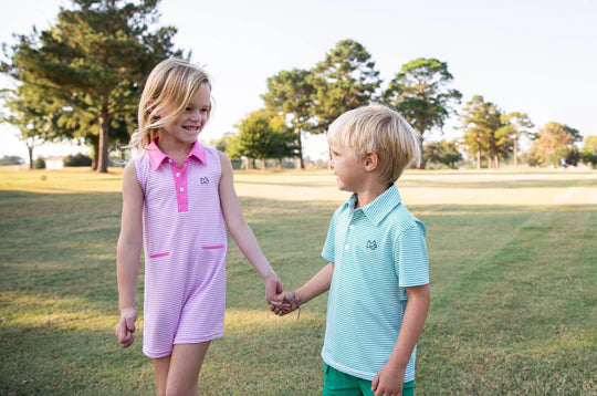 SLEEVELESS PRO PERFORMANCE POLO DRESS - FUCHSIA PINK STRIPE