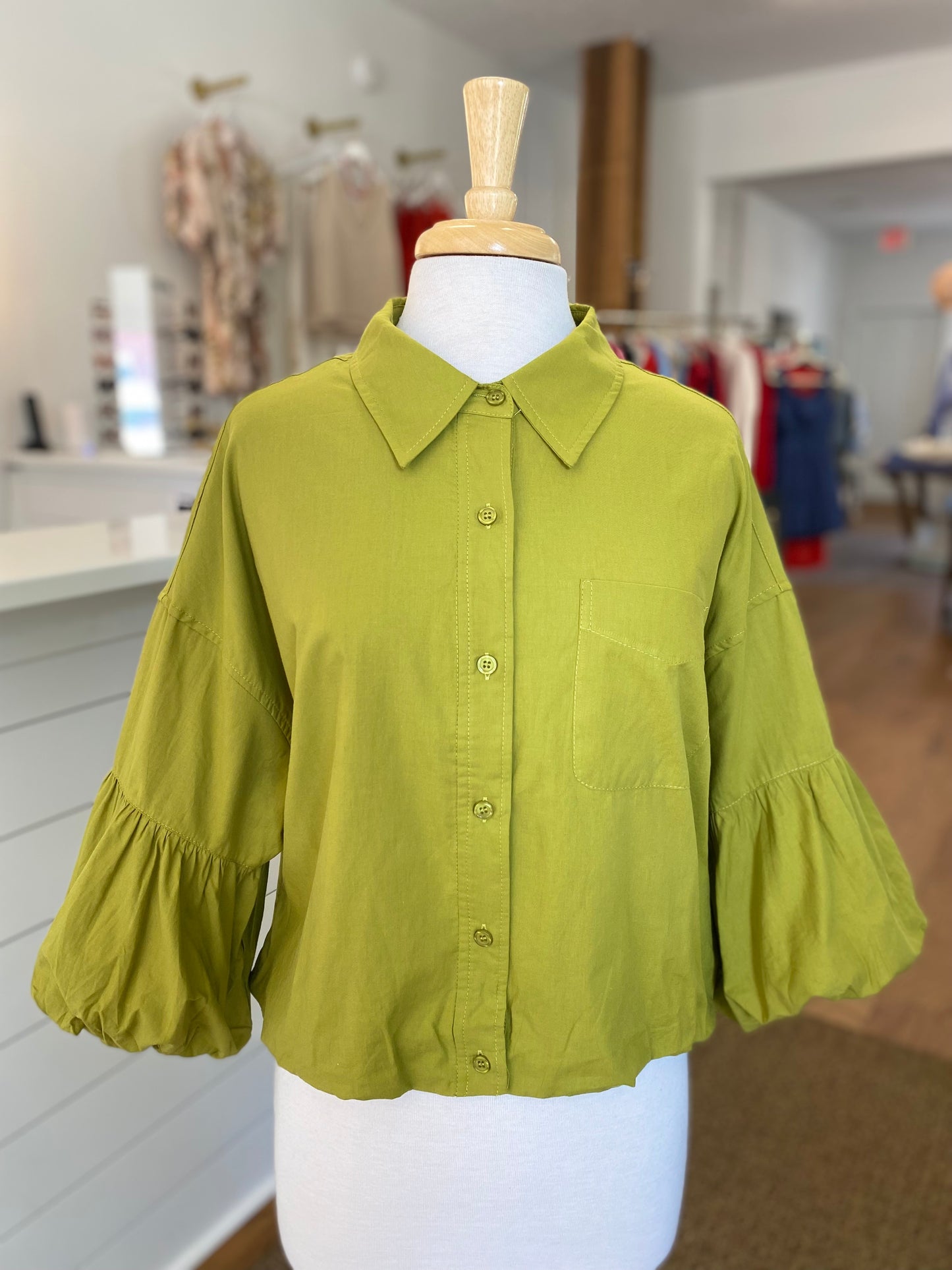 BUTTON DOWN BUBBLE HEM TOP - GREEN ENVY