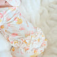 RUFFLE BAMBOO ZIPPER FOOTIE - BUBBLE DUCKIES PINK