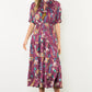 SMOCKED WAIST TASSEL FLORALMAXI DRESS - BURGUNDY
